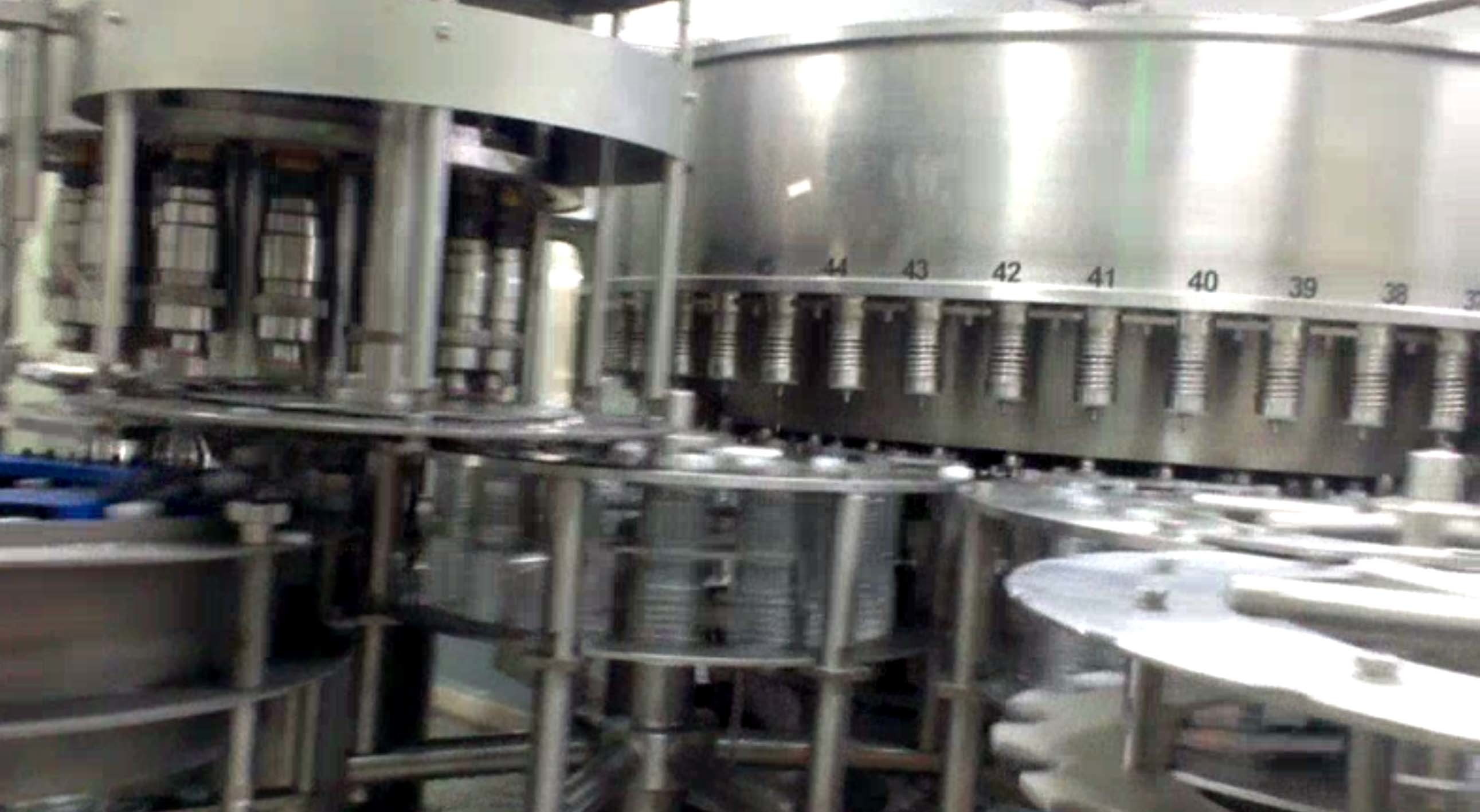 bottling machinery - automatic bottle rinsing filling and capping 